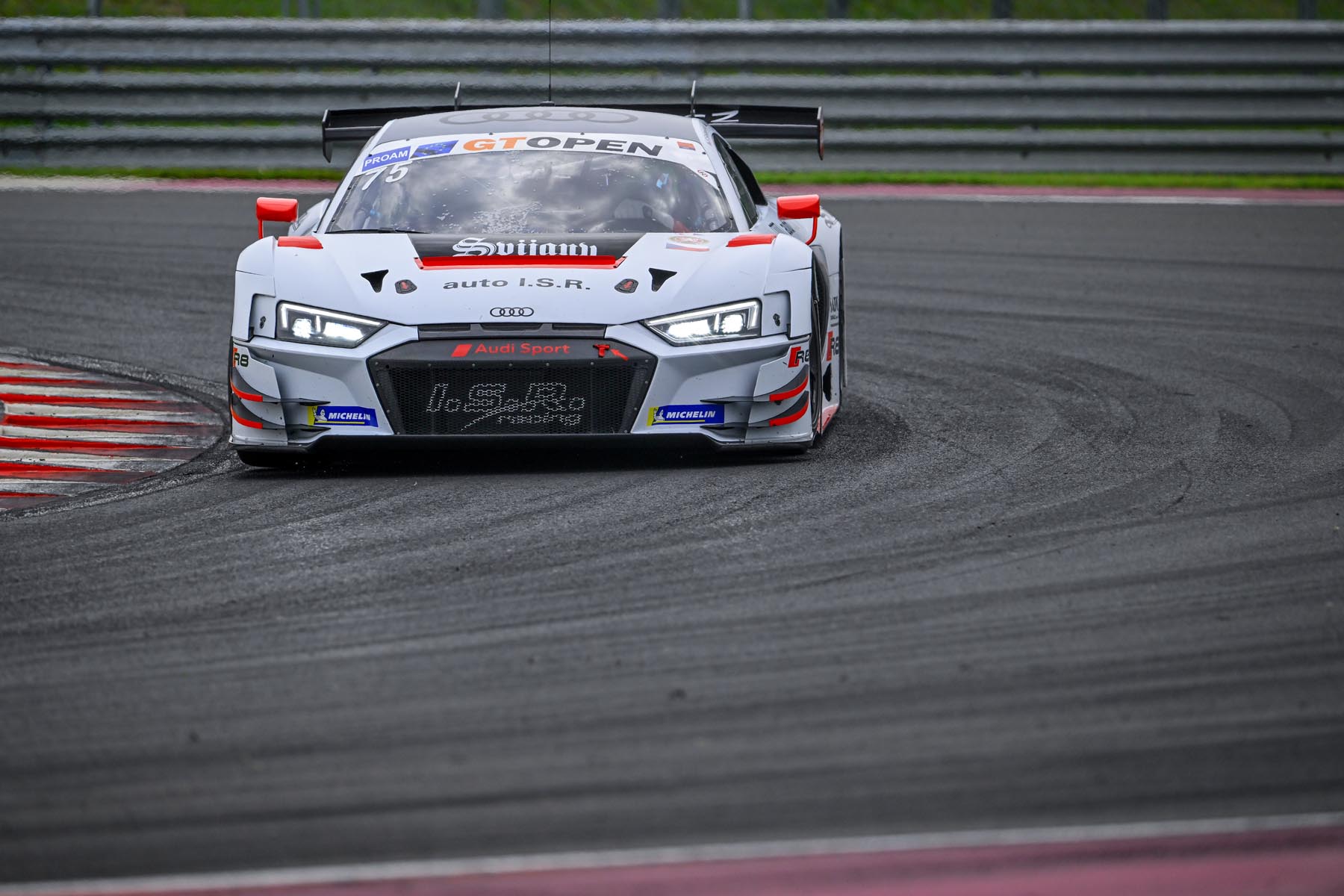 GT cars racing on track at Hungaroring during the 2024 season.